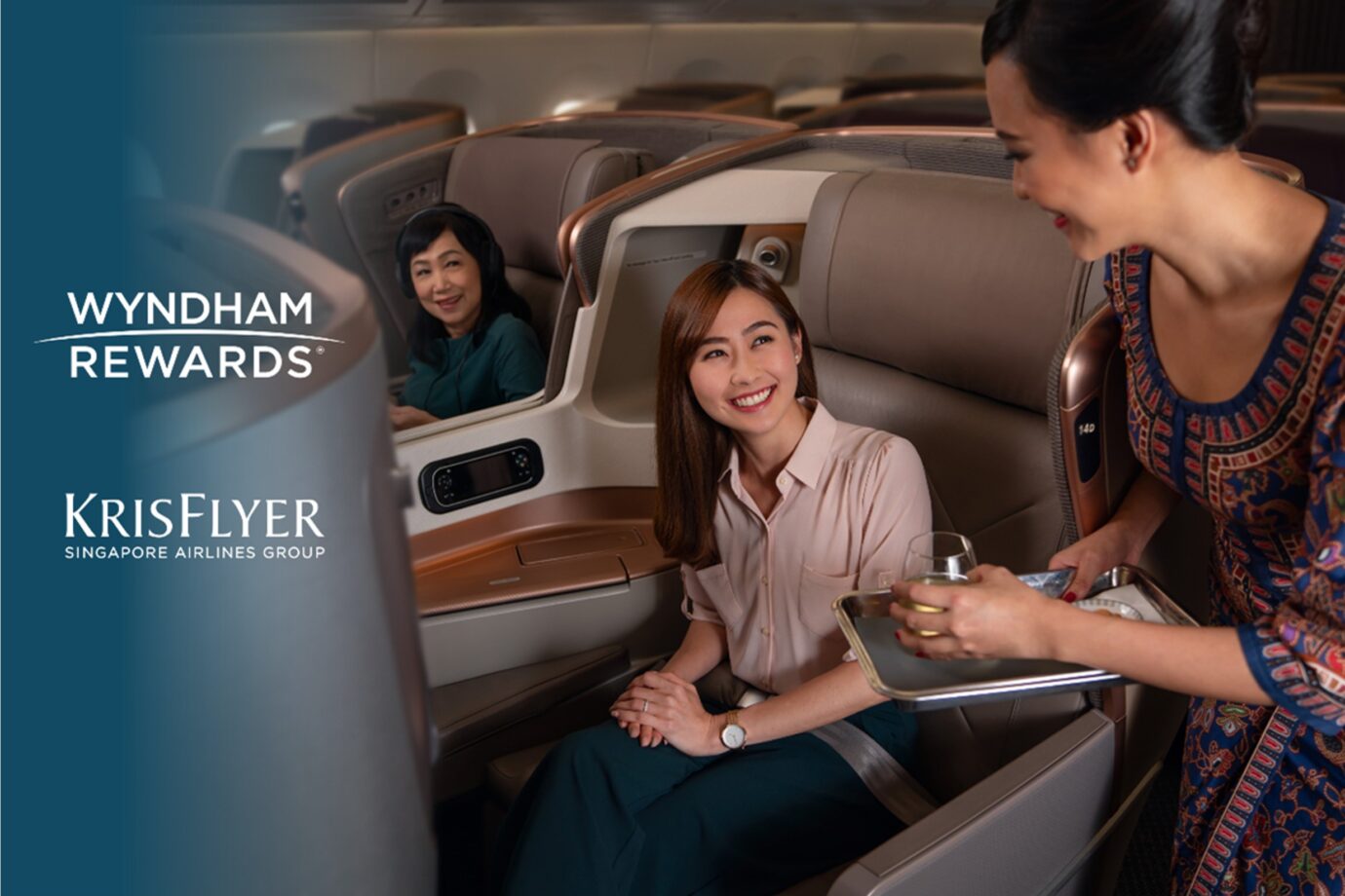 Traveler on plane with flight attendant